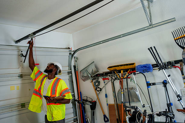 Professional Garage Door Panel Replacement technician working in Parsons, KS